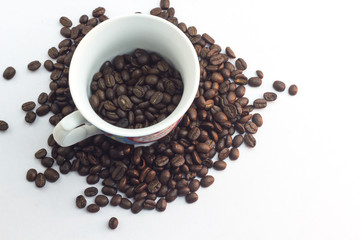 Close up coffee beans and and paper on with table