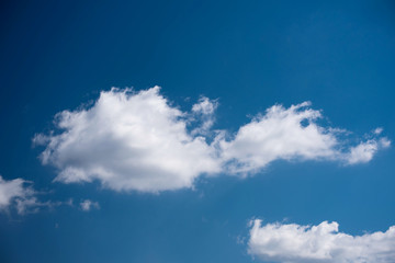 Beautiful Blue sky with fluffy cloud