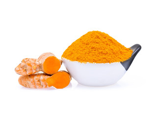 Turmeric roots with turmeric powder on white background