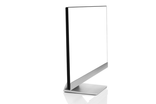 Sleek modern computer display with blank white screen, front side view and isolated on white background with reflection