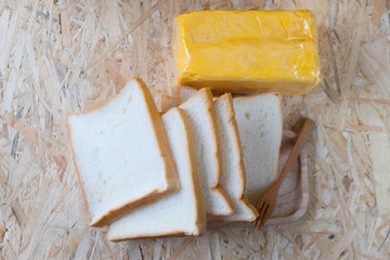 Bread and butter on wood table