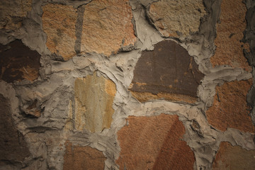 Sandstone brick wall background and textured