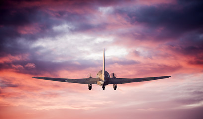 Fototapeta na wymiar Flying airplane silhouette