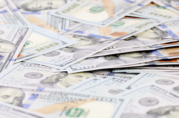 The hundred dollar banknotes as background