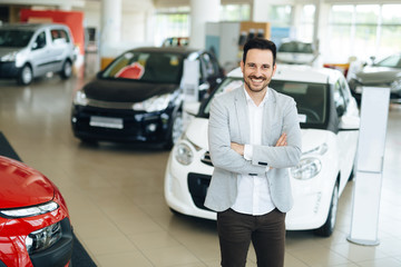 Salesperson at car dealership