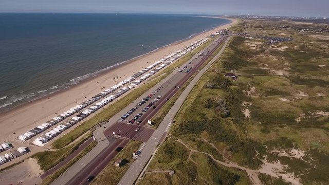 Aerial of Dutch coastline with little vacation huts by Zandvoort.