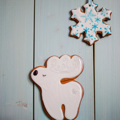 Ginger cookies-reindeer. Delicate turquoise background