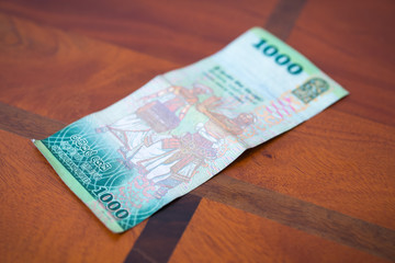 Тысяча рупий.