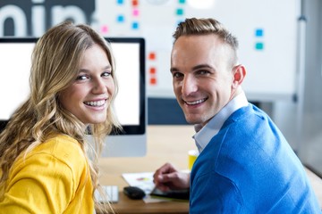 Obraz premium Portrait of smiling colleagues in office