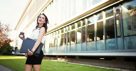 Naklejka premium Beautiful businesswoman outdoors