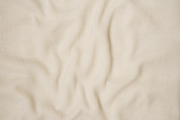 Fototapeta na wymiar Белая бежевая шерстяная ткань текстура