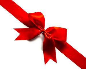 Red satin ribbon and bow isolated on white background