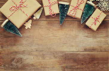 handmade gift boxes over wooden background