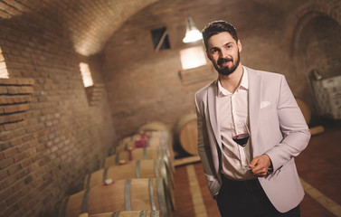 Wine maker testing wines