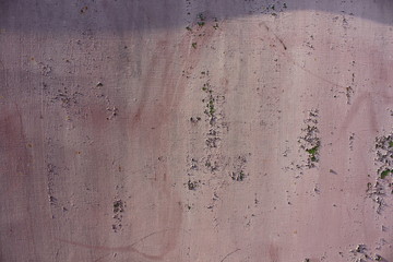 pink cracked paint on metal background