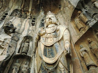 Ancient Buddha carvings into rock in southern China site