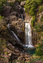 Fototapeta na wymiar a Sunny Day in Arado Waterfall, Geres National Park, Portugal