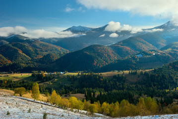First snow in mountains Carpathians