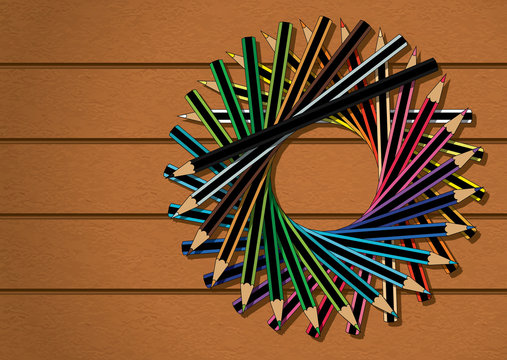 Colour Pencils Stacked in Circle on Wood Texture Background