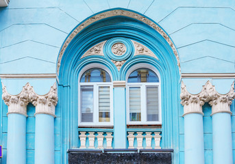 architecture of the historic building. Facade with pillars and Arch