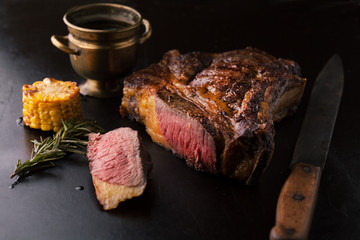 Grilled Black Angus Steak Ribeye  with rosemary and corn