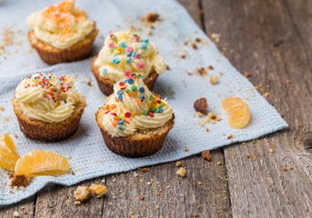 Cupcakes with white frosting and sprinkles
