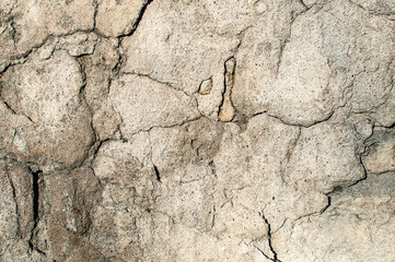Texture of old stone wall covered with cement