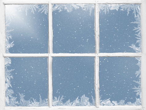 frosty border on weathered windowpane with snowflakes
