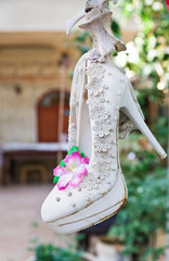 Wedding shoes hanging as Decorations