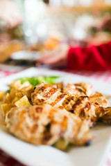 Grilled poultry meat with vegetables