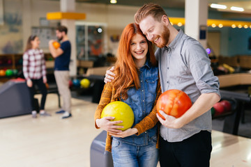 Fototapeta premium Beautiful couple dating and bowling