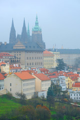 Fototapeta na wymiar Prague, Czechia - November, 24, 2016: panorama of an old Prague with St. Vitus Cathedral and Prague Castle, Czechia