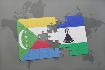 puzzle with the national flag of comoros and lesotho on a world map