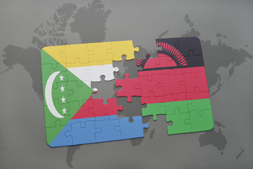 puzzle with the national flag of comoros and malawi on a world map