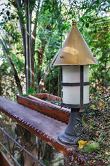 Fototapeta na wymiar decorative lamp on the railing