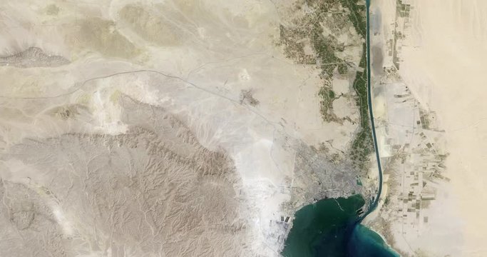 High-altitude Overflight Aerial Of The Suez Canal Between Suez And Fayed. Clip Loops And Is Reversible. Elements Of This Image Furnished By USGS/NASA Landsat 