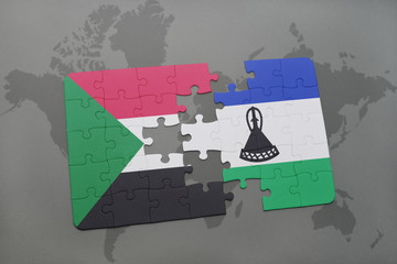 puzzle with the national flag of sudan and lesotho on a world map