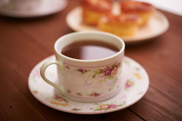 tea and sweets on a wooden table