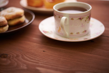 tea and sweets on a wooden table