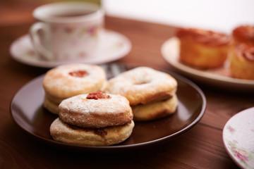 tea and sweets on a wooden table