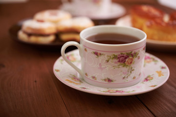 tea and sweets on a wooden table