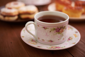 tea and sweets on a wooden table