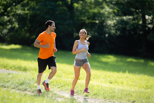 Couple jogging outdoors
