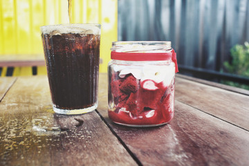 Red velvet cake with cola drink