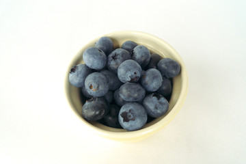 Fresh blueberries in a cute bowl