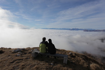 Watching the clouds from the top of the mountain