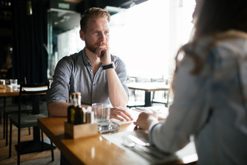 Couple dating in restaurant