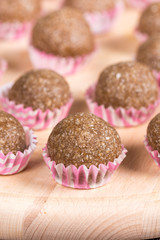 Selective focus on chocolate cupcake with coconut with shallow f
