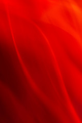 Obraz premium Red blurred abstract background. Light in motion