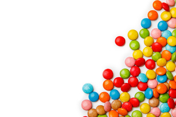 colorful chocolate buttons on white background